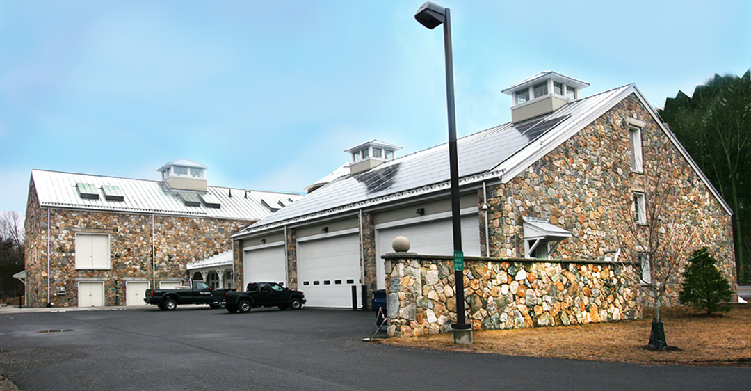 Water treatment plant with solar array in Bedford, NY, constructed by The Sisca Organization.